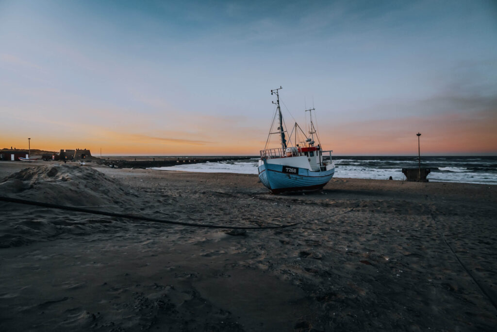 Fishing boat on the beach at Thorup Strand on the North Sea coast of Denmark